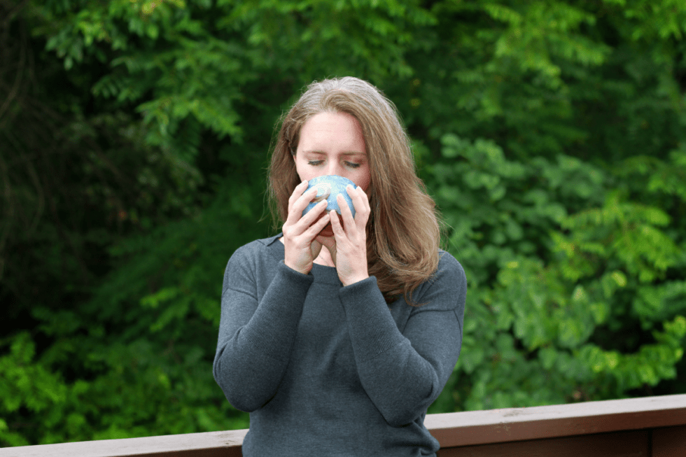 Beth drinking tulsi rose tea, low histamine tea