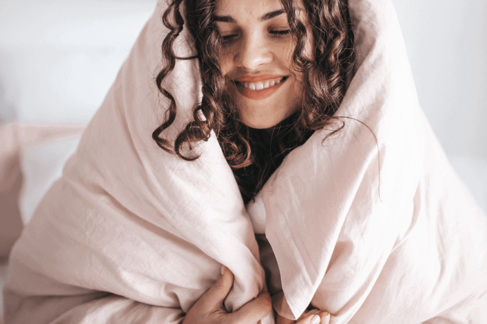 woman wrapped in blanket