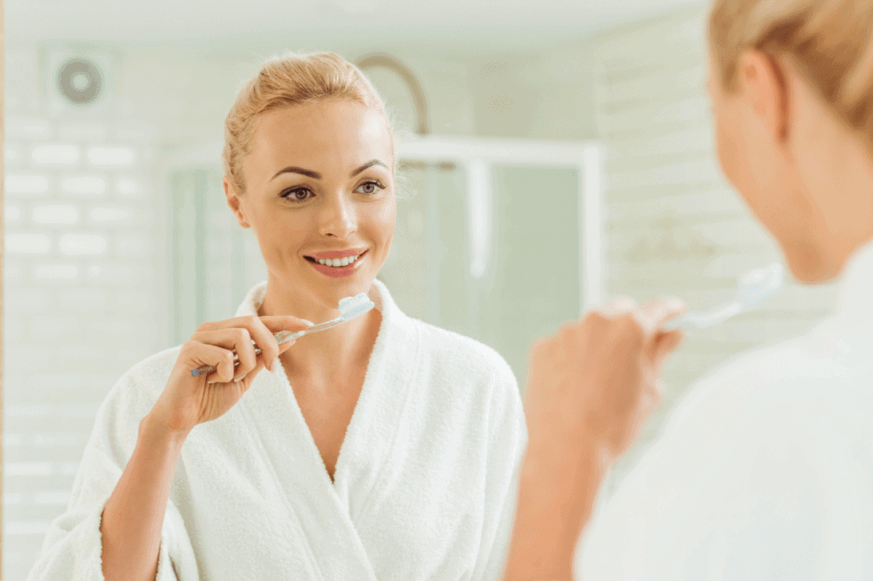 woman brushing teeth