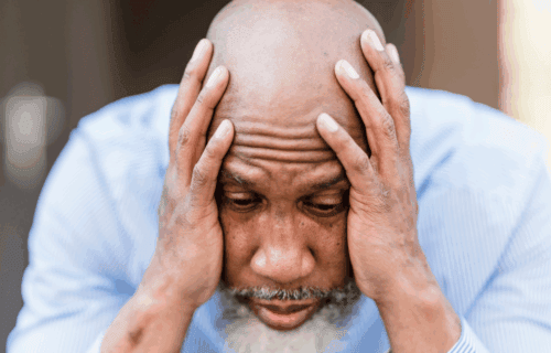 Can Mold Affect Your Brain? Man holding his head