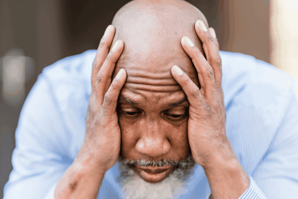 Can Mold Affect Your Brain? Man holding his head