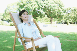 Resonant Breathing Exercises - Woman in a Chair Outside
