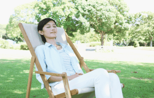Resonant Breathing Exercises - Woman in a Chair Outside